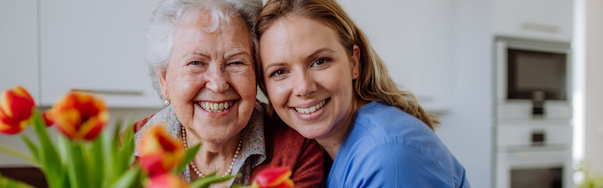 carer and senior woman at home